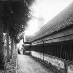 View down east side of Long Alley almshouses